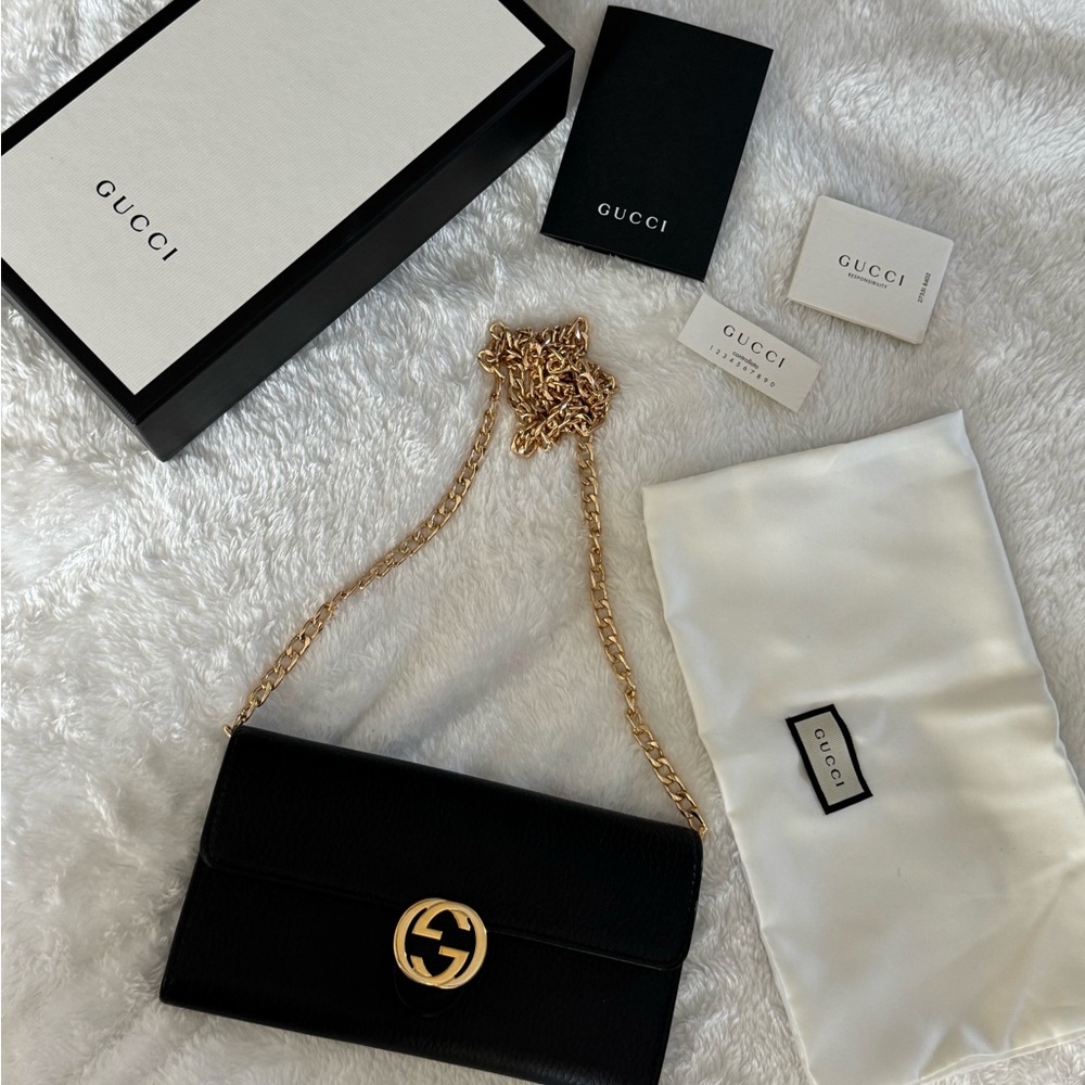 Authentic Gucci Black and Gold Crossbody Bag with Iconic GG Logo